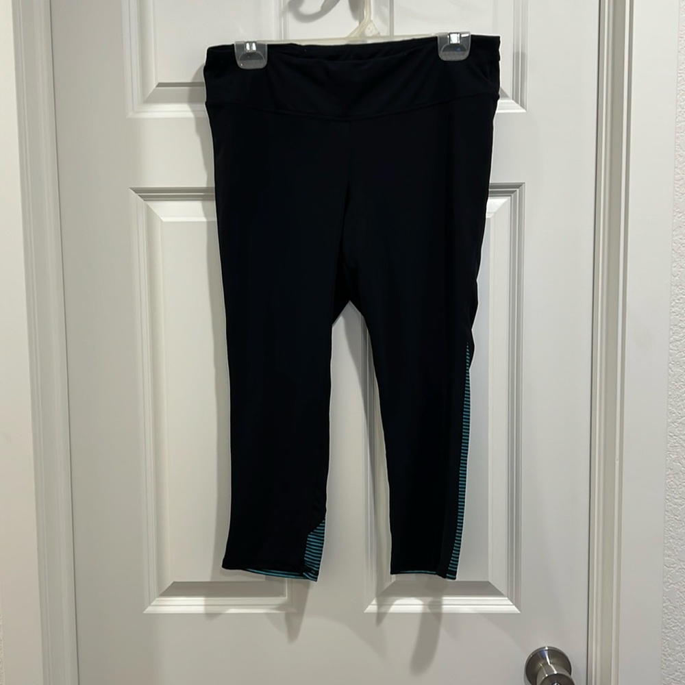 Gap fit activewear black Capri leggings. Size L with calf black/green stripe.